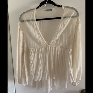 Ivory long sleeved blouse